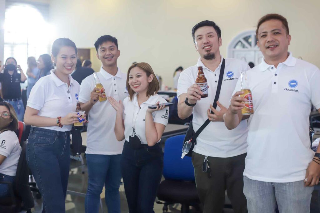 A group of Cloudstaffers with their beer