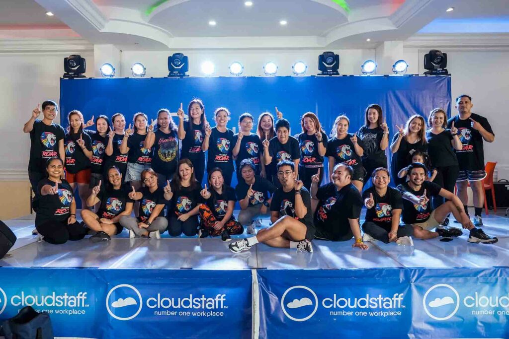Cloudstaffers on CS Sky Club stage doing the #1 sign